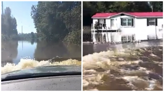 Guy Hilariously Cheers His Volvo Through Impossibly Deep Flood Water